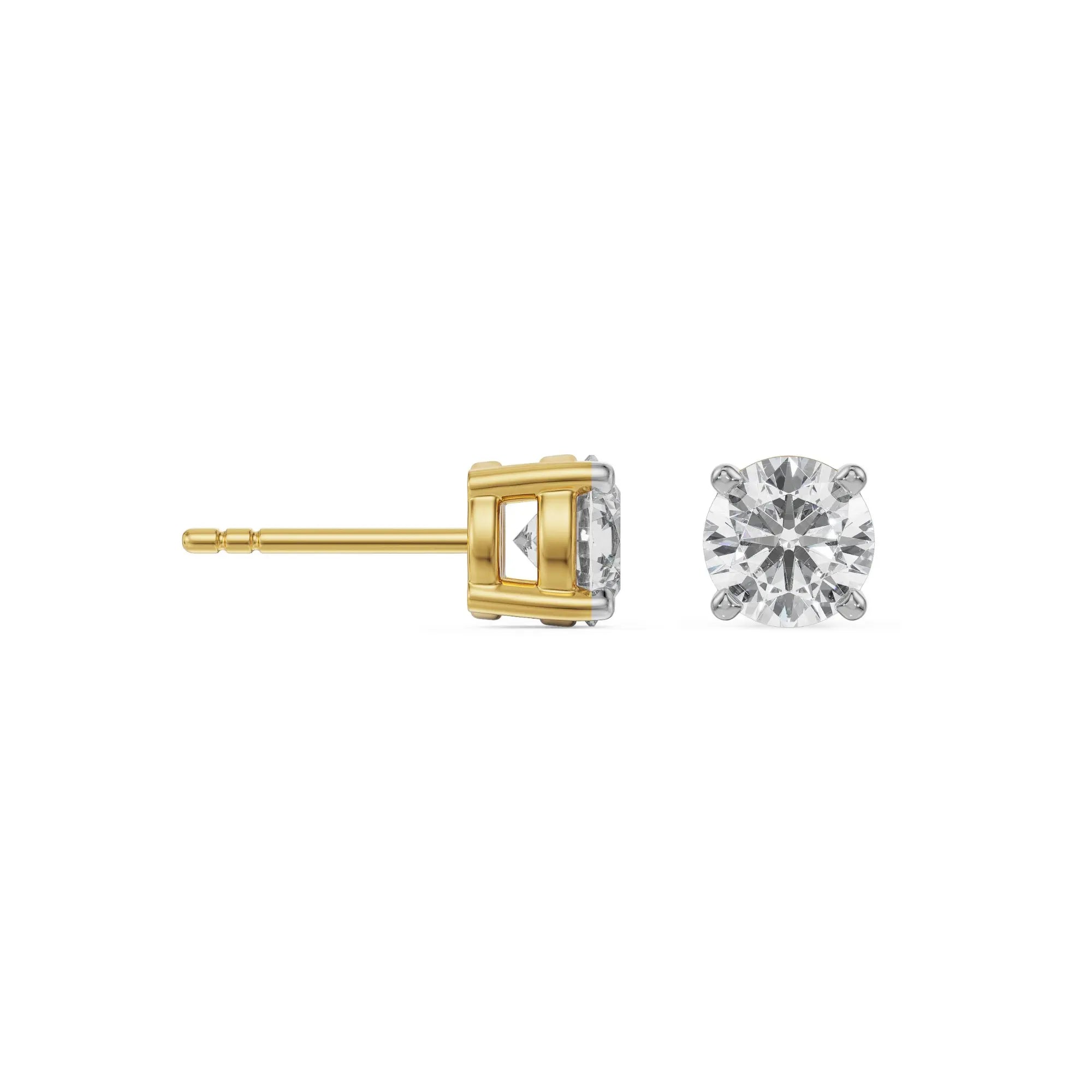 Gold and silver diamond earring on a white background