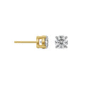 Gold and silver diamond earring on a white background