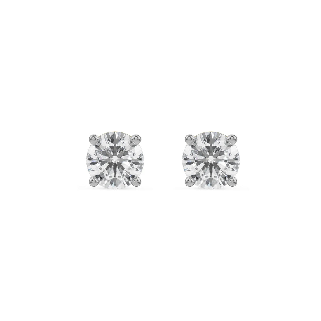 Gold and silver diamond earring on a white background