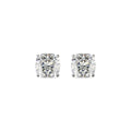Pair of diamond stud earrings on a white background