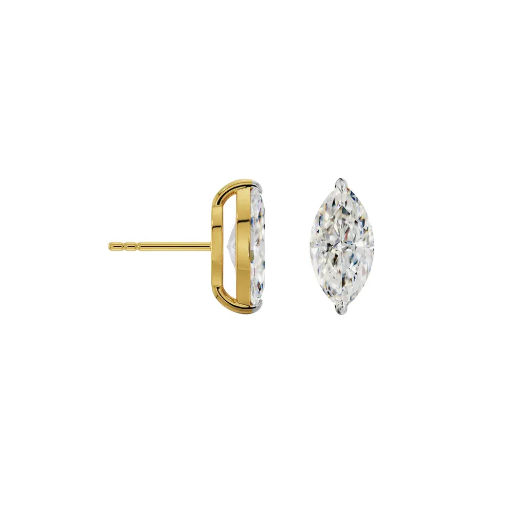 Gold and clear crystal earring on a white background