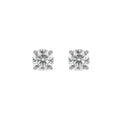 Pair of diamond stud earrings on a white background