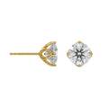 Gold stud earrings with clear gemstones on a white background