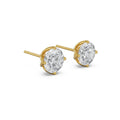 Gold earrings with clear gemstones on a white background