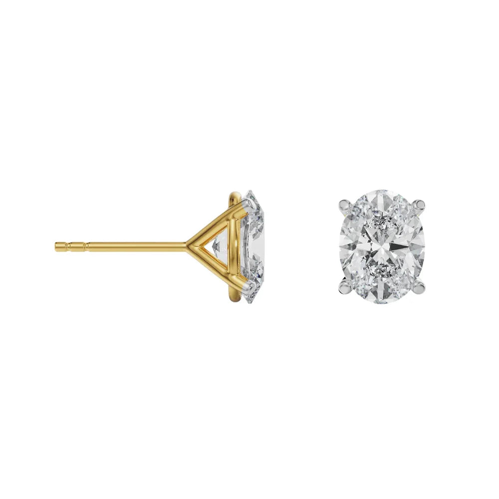 Gold and silver diamond stud earrings on a white background