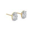 Gold and diamond stud earrings on a white background