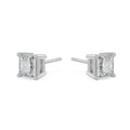 Pair of diamond stud earrings on a white background