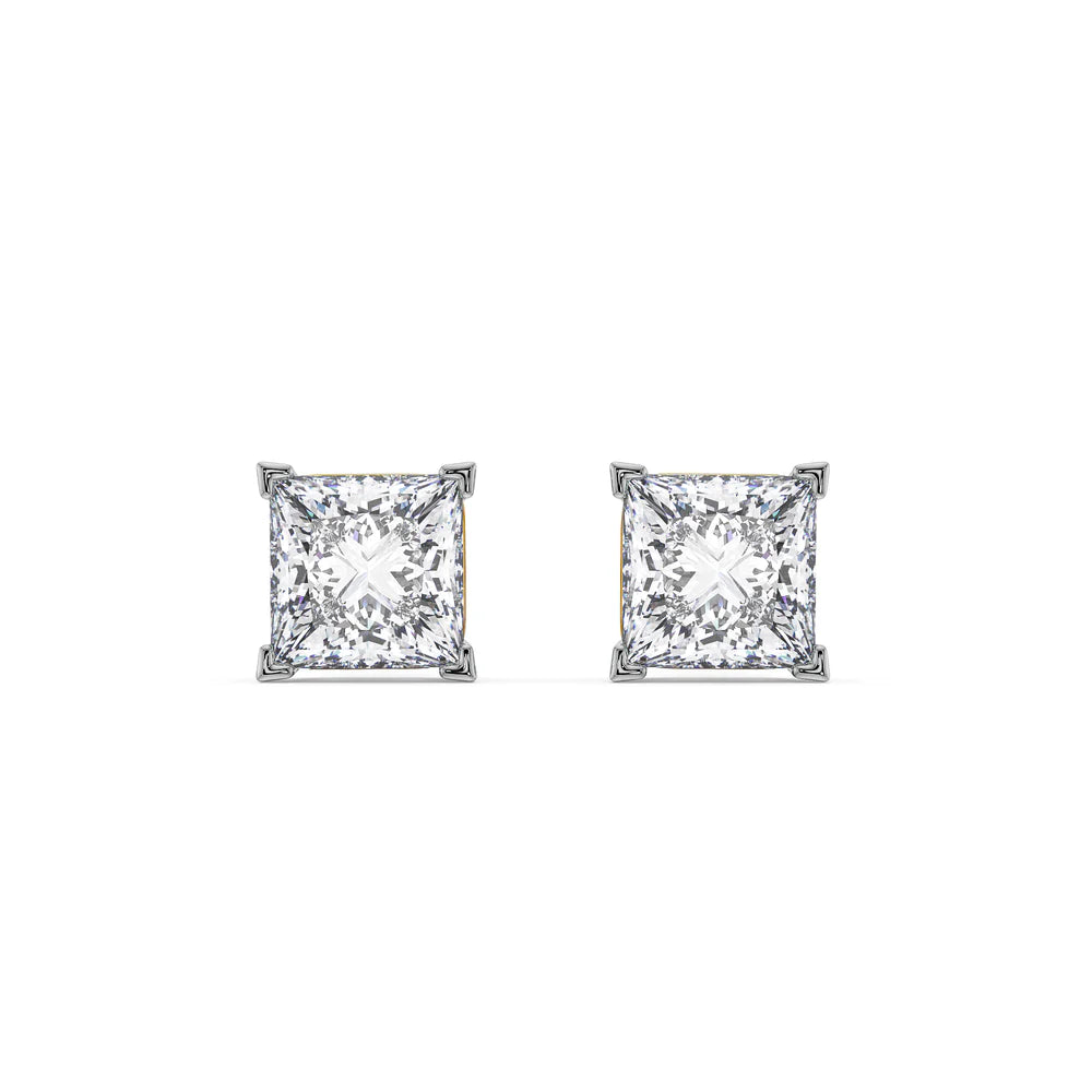 Gold and silver diamond stud earrings on a white background