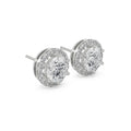 Pair of diamond stud earrings on a white background