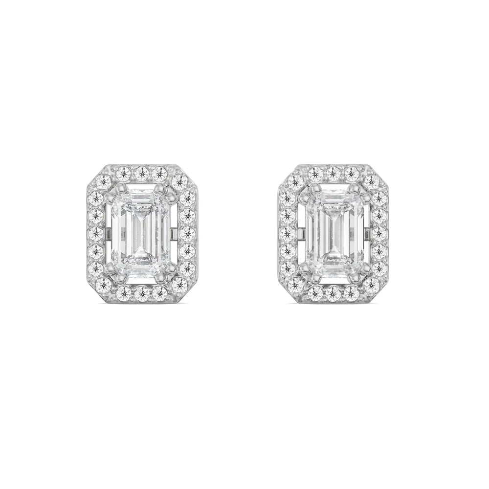 Pair of diamond earrings on a white background